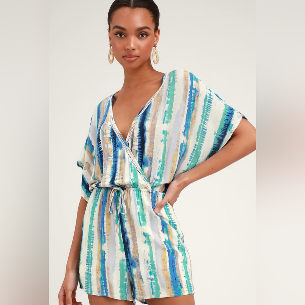 New w/tags! Beachy Lulu romper w/snap at bust. Beautiful colors! Medium size.